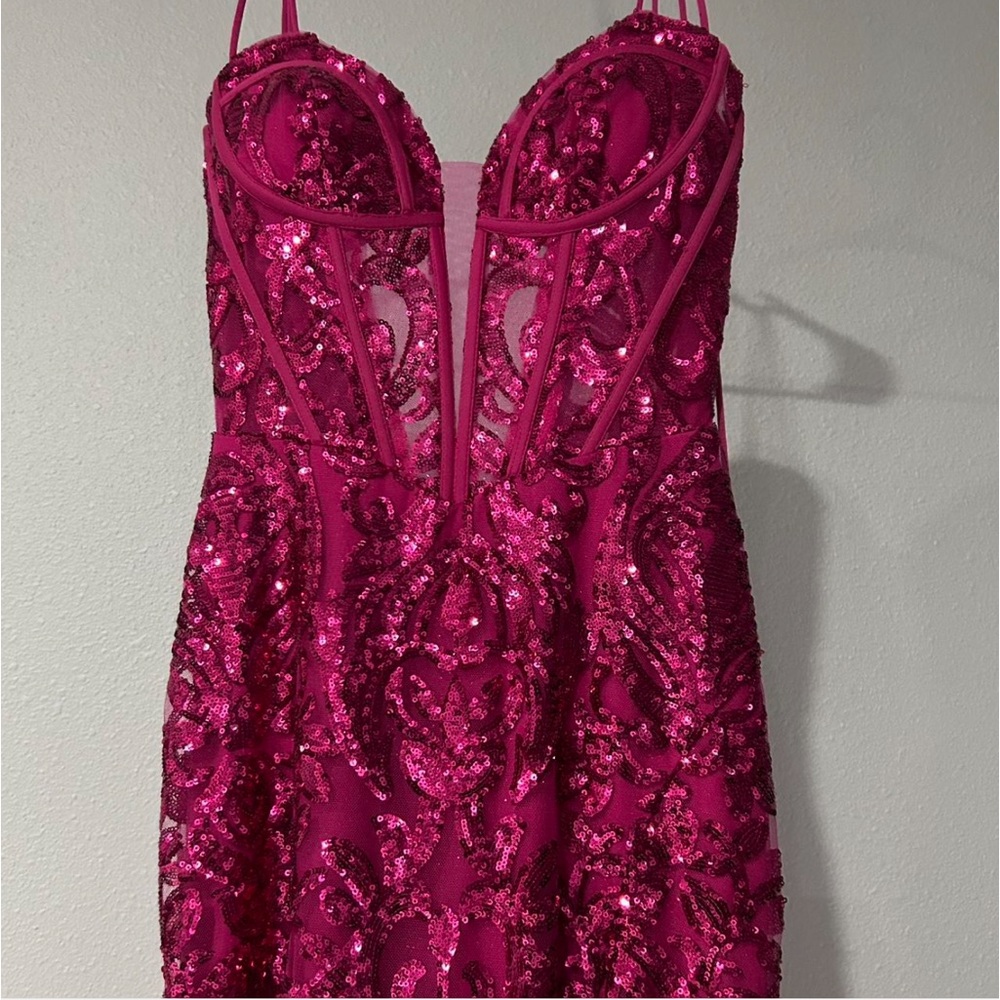 Pink sequin dress with a corset style, very flattering! slit on side of leg!